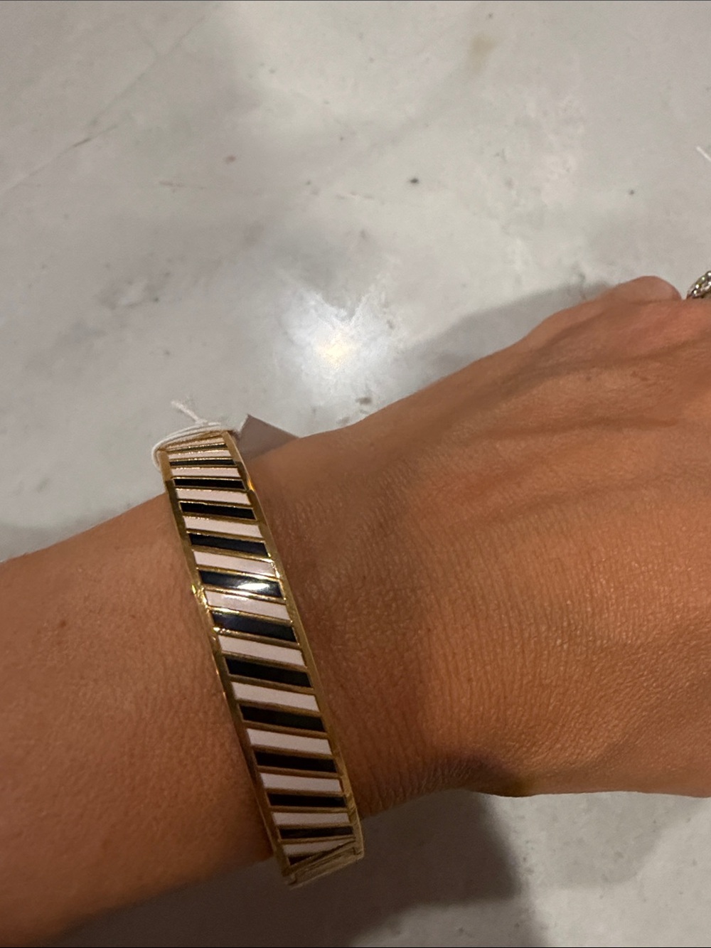 Gold-Tone Black and White Striped Bangle Bracelet